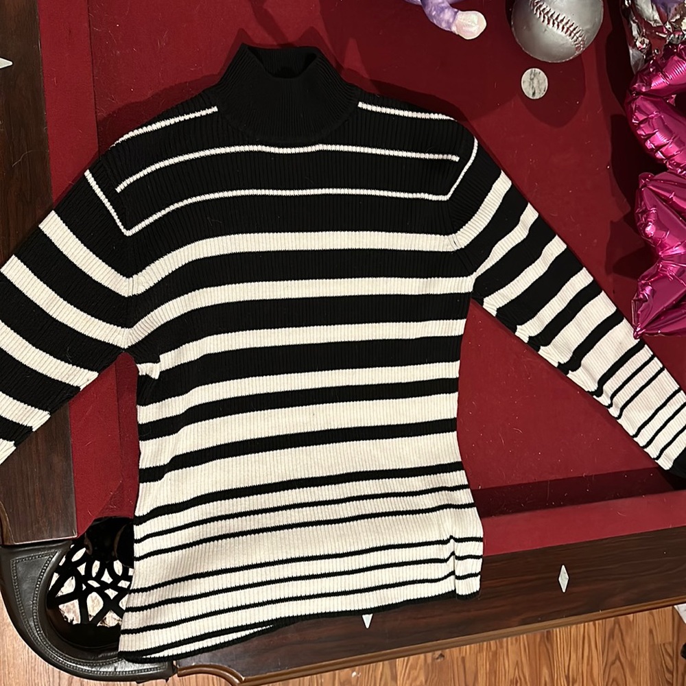 small black and white turtleneck yarn works sweater